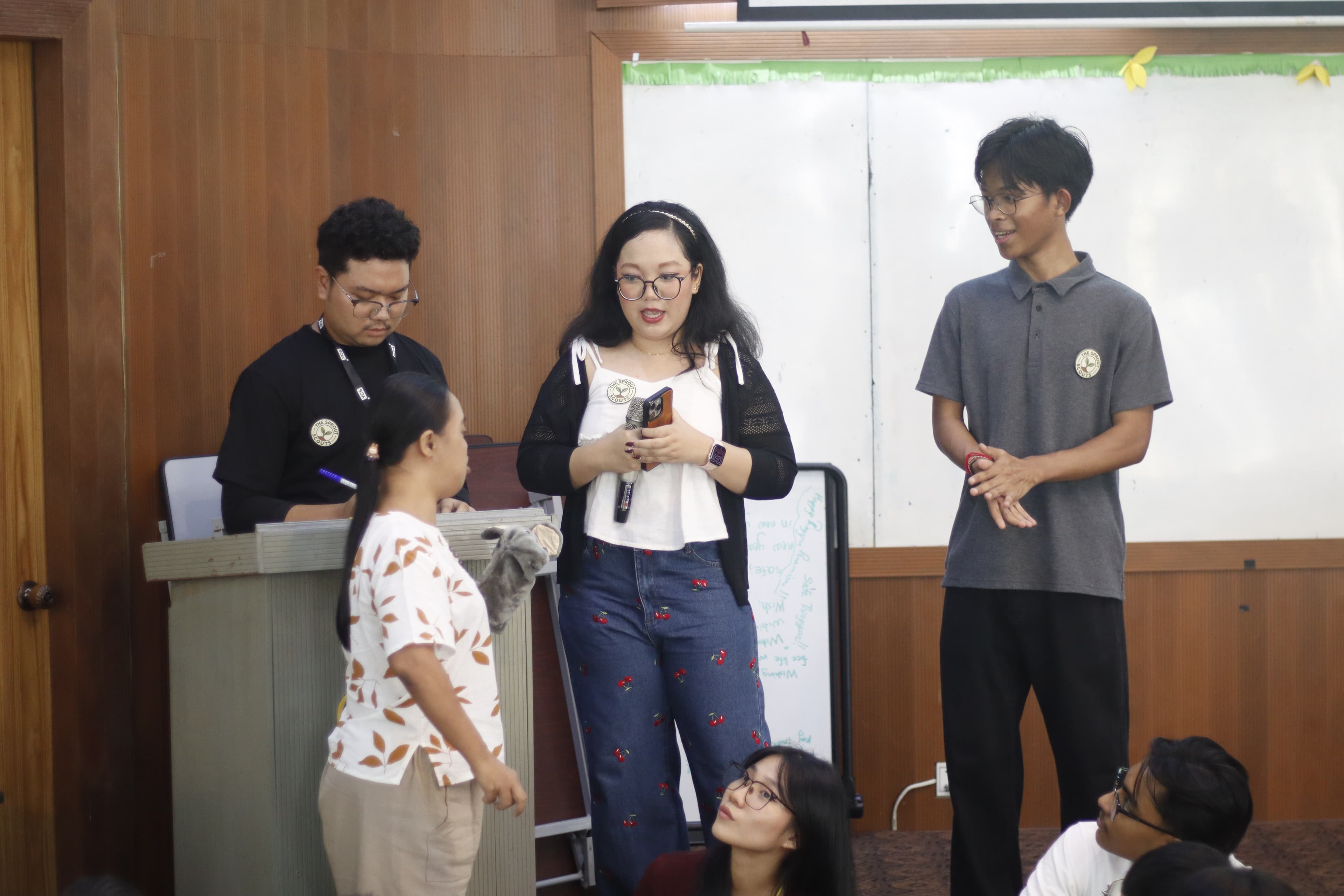 Facilitators presenting at the front of the workshop room